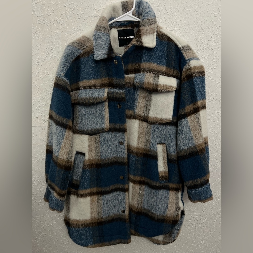 I bought this jacket in Germany a year ago. So warm and easy to style.